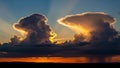 Dramatic Sunset Sky with Luminous Cumulonimbus Clouds and Sun Rays Breaking Through Keywords: sunset, sky, clouds Royalty Free Stock Photo