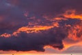 Dramatic sunset sky with orange colored clouds Royalty Free Stock Photo