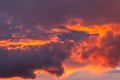 Dramatic sunset sky with orange colored clouds Royalty Free Stock Photo