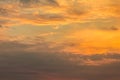 Dramatic sunset sky with orange colored clouds, colorful background Royalty Free Stock Photo