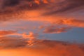 Dramatic sunset sky with orange colored clouds soft focus Royalty Free Stock Photo