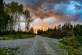 Dramatic sunset sky over a gravelroad in Varmland Sweden Royalty Free Stock Photo