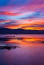 Dramatic sunset sky over the lake and mountains Royalty Free Stock Photo