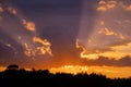 Dramatic sunset sky panorama with burning colourful clouds background. Idyllic cloudscape backdrop at dawn. Majestic cloud scenery