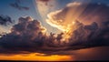 Dramatic Sunset Sky with Sun Rays Breaking Through Dark Storm Clouds Over a Distant Horizon Royalty Free Stock Photo