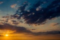 Dramatic sunset sunrise sky with dark blue clouds Royalty Free Stock Photo