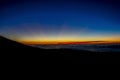 Dramatic sunset on top of Haleakala Crater in HawaII with copy space Royalty Free Stock Photo