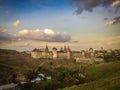 Dramatic sunset view on the castle in Kamianets-Podilskyi in spring. Royalty Free Stock Photo