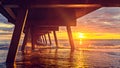 Dramatic sunset view from under pier