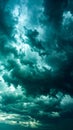Dramatic teal and black storm clouds filling the sky creating a moody atmosphere Royalty Free Stock Photo