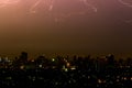 Dramatic thunder storm lightning bolt on the horizontal sky and city scape Royalty Free Stock Photo