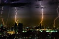 Dramatic thunder storm lightning bolt on the horizontal sky and city scape Royalty Free Stock Photo