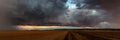 Dramatic thundercloud over a wheat field