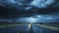 A dramatic thunderstorm over a deserted road, showcasing lightning and dark clouds reflecting on wet pavement Royalty Free Stock Photo