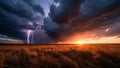 Dramatic time-lapse of storm clouds gathering over a vast prairie at sunset with lightning striking through clouds Royalty Free Stock Photo