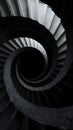 Abstract Black and White Spiral Staircase Leading to Darkness Royalty Free Stock Photo