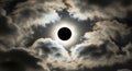Dramatic Total Solar Eclipse with Bright Corona and Cloudy Sky Royalty Free Stock Photo