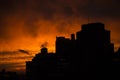 Dramatic Urban Sunset in New York City silhouette