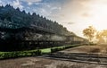 Dramatic view of ancient stupa borobudur temple with ray sunrise in the morning. the world`s largest Buddhist temple and UNESCO
