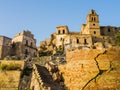 Dramatic view of Craco ruins, ghost town abandoned after a landslide, Basilicata region, southern Italy