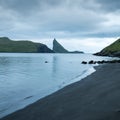 Dramatic view on Drangarnir and Tindholmur sea stacks