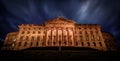Dramatic view of the facade of the Neoclassical Wilhelmshohe castle at night in Kassel, Germany Royalty Free Stock Photo