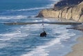 Dramatic view of hang glider approaching Torrey Pines Gliderport, La Jolla, CA.