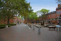Dramatic view of Inn Street in historic downtown seaport Newburyport, Massachusetts, with brick sidewalks, near the Merrimack Rive