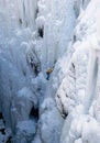 Mountain Climber On Icy Cliff