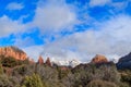 Dramatic view of Sedona's red sandstone formations and high desert forest.