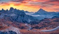 Dramatic  view of Tre Cime Di Lavaredo National Park with winding road. Royalty Free Stock Photo