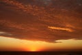 Dramatic Volcanic Crimson Sunset over Pacific Ocean Royalty Free Stock Photo