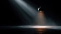 Dramatic Warm Spotlight on Dark Concrete Floor Stage Background with Hanging Lamp and Copy Space Royalty Free Stock Photo