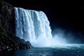 Dramatic waterfall isolated against black backdrop, powerful water flow, nature, rocky, cascade Royalty Free Stock Photo
