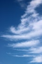 Dramatic white clouds against a blue sky