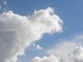 Dramatic white clouds in blue sky