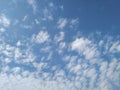 Dramatic White Clouds in a Blue Sky Background. Heavenly feeling white Cloud in a summer season at mid day