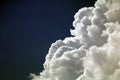 Dramatic white clouds on blue sky