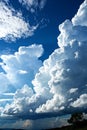 Dramatic white clouds over deep blue sky Royalty Free Stock Photo