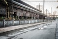 Dramatic wide angle shot of abandoned industrial factory with decaying wall