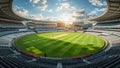 Dramatic wide angle view of a massive empty cricket stadium pitch bathed in golden sunset light with two small figures practicing Royalty Free Stock Photo