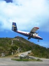 Dramatic Winair plane landing at St Barts airport Royalty Free Stock Photo