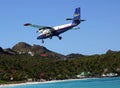 Dramatic Winair plane landing at St Barts airport Royalty Free Stock Photo