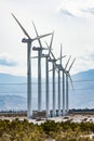 Dramatic Wind Turbine Farm in the Desert of California. Royalty Free Stock Photo