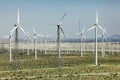 Dramatic Wind Turbine Farm in the Desert of California. Royalty Free Stock Photo