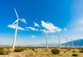 Dramatic Wind Turbine Farm in the Desert of California. Royalty Free Stock Photo