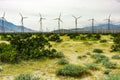Dramatic Wind Turbine Farm in the Desert of California. Royalty Free Stock Photo