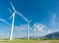 Dramatic Wind Turbine Farm in the Desert of California. Royalty Free Stock Photo