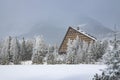 Dramatic winter wood land landscape with wooden cabin beautiful house in outdoor wilderness environment space of Slovakia mountain