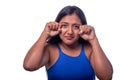 Dramatic woman making a crying face. Sad and crying black woman isolated on all white background.